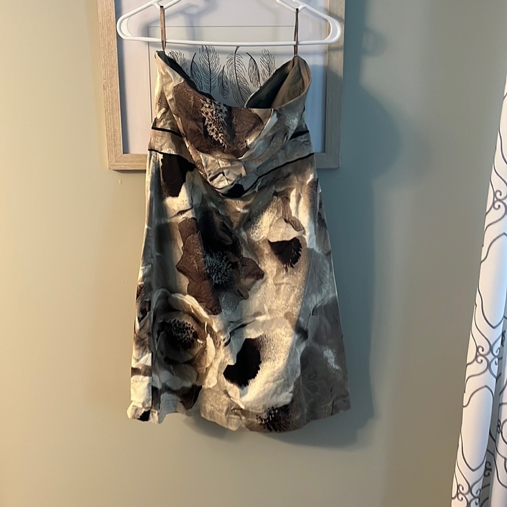 Strapless Cocktail dress. Worn a couple times. Sits right above knee.